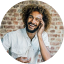 Person smiling looking to the side
